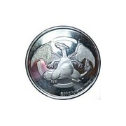 Moneda Charizard